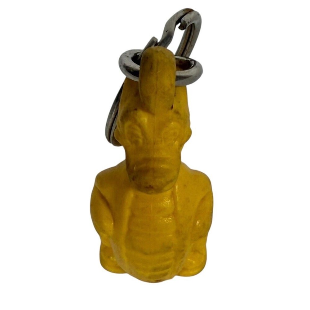 Vintage Tupperware Douglas Dirt Walker Dragon Dinosaur Keychain Yellow 2in